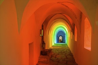 Colourfully illuminated cloister in the Carthusian monastery of Allerengelberg, Schnalstal Valley,