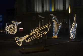 Illuminated instruments, world of lights, university square in front of the opera house, Magdeburg,