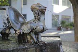 Mythical creature with bird and woman Figure from the Elwetritschenbrunnen by Gernot Rump 1978,