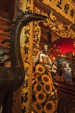 HANOI, VIETNAM, JUNE 11, 2011: Confucius statue at the Temple of Literature. This temple is