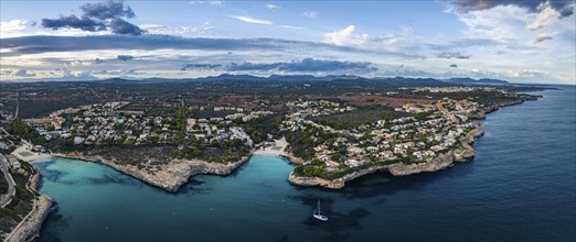 Sunset over Cala Anguila-Cala Mendia from a drone, Porto Cristo, Majorca, Spain, Europe