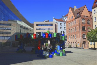 In the historic centre of Nuremberg, art with barrels in front of the Neues Museum Nuremberg,