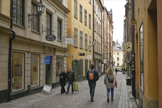 Passers-by, tourists, Köpmangatan alley, Old Town, Gamla Stan, Stockholm, Sweden, Europe