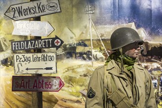 Diorama with American WWII soldier in the Overlord Museum near Omaha Beach about WW2 Allied landing