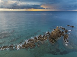 The reef Arrecife de las Sirenas in the Nature Reserve Cabo de Gata-Nijar, at sunrise with heavy