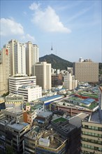 View of the houses of Seoul, in the back the N Seoul Tower on Namsan Hill or South Mountain,