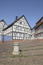 Main bank with half-timbered house and stone bollard, Seligenstadt, Main, Hesse, Germany, Europe