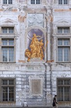 Façade fresco on the Palazzo San Giorgio, built in 1260, Piazza Caricamento, Genoa, Italy, Europe