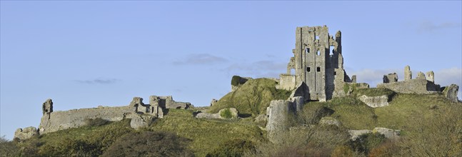 Ruins of the medieval Corfe Castle on the Isle of Purbeck along the Jurassic Coast in Dorset,