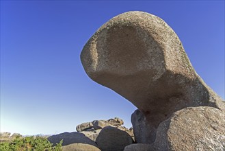 Strange rock formations and water, wind eroded boulders along the Côte de granit rose, Pink Granite