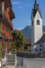 Schwarzenberg, Bregenz district, Bregenzerwald, parish church, tower clock, inn, wooden house,