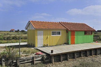 Colourful cabins of oyster farm near Dolus, Saint-Pierre-d'Oléron on the island Ile d'Oléron,