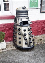 Dr Who Dalek model used as a waste bin, Aldbourne, Wiltshire, England, United Kingdom, Europe