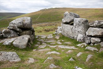 Entrance to the late Bronze age enclosed settlement site of Grimspound, Dartmoor national park,