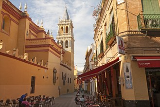 Cafe and alleyway by the Iglesia de Santa Ana, Triana, Seville, Spain, Europe