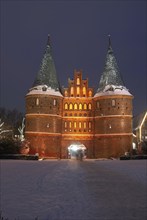 Lübeck, Holstentor at night in winter