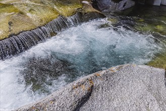 Rein da Christallina torrent near Medel. Pools with crystal-clear water in the riverbed. Canton of