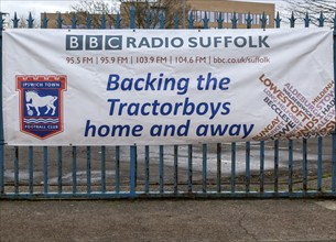 Banner adverting BCC Radio Suffolk support for Ipswich Town football club, Ipswich, Suffolk,