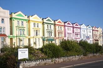 Colourfully painted guesthouses and hotels on the Esplanade, Paignton, Devon, England, United