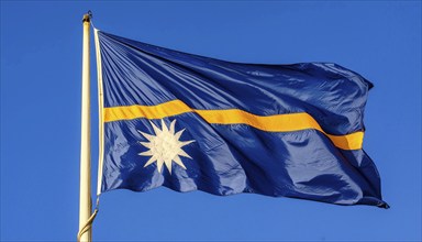 The flag of Nauru, an island nation in the Pacific Ocean, flutters in the wind, isolated against a