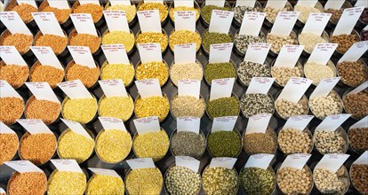 Samples of pulses kept on display inside a shop at a wholesale market ahead of the presentation of