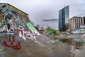 Building of the European Central Bank, ECB, skate park in the rain, at the Osthafen, at the Main in