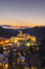 Winter evening in the Müglitz valley, impressively illuminated Weesenstein Castle at the blue hour,