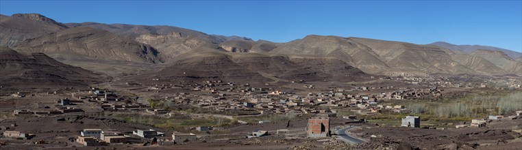 View of Taboulmante with colourful mountains in the background, layered landscape, Gorges du Dades,