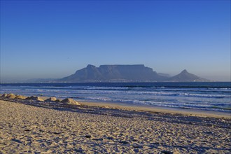 From Bloubergstrand to the silhouette of Cape Town, Cape Town, with Table Mountain, Cape Town,