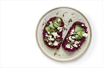 Sandwiches with beetroot hummus, cucumber and blue cheese, microgreens, rye bread, breakfast,