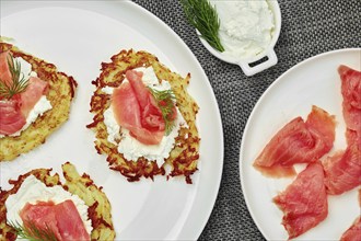 Top view of potato latke with salmon and cream cheese