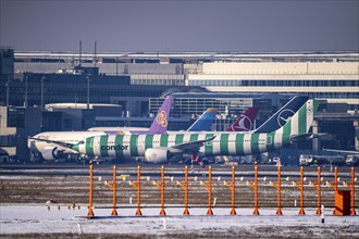 Aircraft on the taxiway at Frankfurt FRA airport, Fraport, in winter, Hesse, Germany, Europe