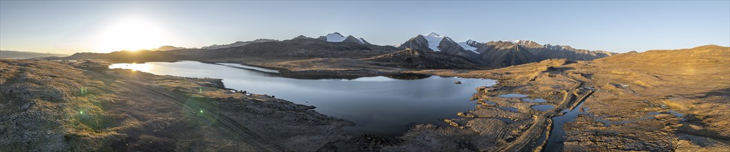 Aerial view, mountain peak and mountain lake, evening mood, Arabel Lake at Arabel Pass, Issyk Kul