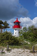 The Gellen lighthouse rises at the southern tip of the island of Hiddensee, Vorpommersche