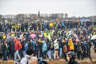 Many thousands of demonstrators march after a demonstration against the demolition of the lignite