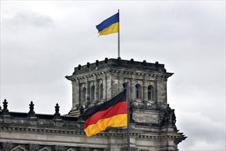 On the anniversary of the Russian war of aggression against Ukraine, Ukrainian flags are hoisted at