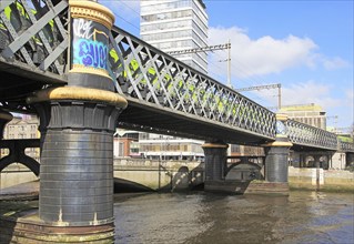 Loopline rail bridge or Liffey viaduct spanning river from Pearse railway station, Dublin, Ireland,