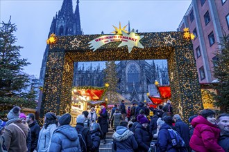 Christmas market at Roncalli Platz am Dom, in the city centre of Cologne, Sunday shopping in