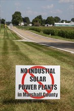 Rutland, Indiana, A sign along a rural road opposes a solar power installation in Marshall County