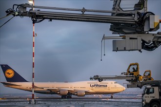 Winter at Frankfurt Main Airport, FRA, de-icing vehicles waiting for aircraft to be de-iced, Hesse,