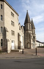 Building originally built as a barracks to house single workers in the nineteenth century planned