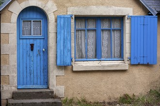 Old house facade with blue door and blue window, Ile de Brehat, Brittany, France, Europe