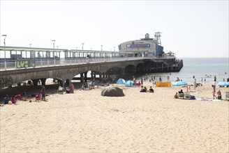 The pier and sandy beach at Bournemouth, Dorset, England, UK