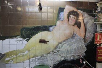 Female nude mural wall picture inside famous historic Los Gatos Cervecerias bar, Madrid, Spain,