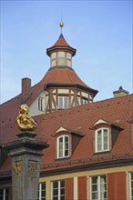 Community centre of St. Gumbertus with monument to Johann Sebastian Bach at the