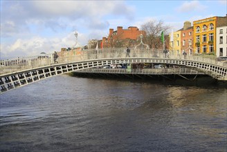 Ha'penny Bridge, historic pedestrian bridge crossing River Liffey, city of Dublin, Ireland, Irish