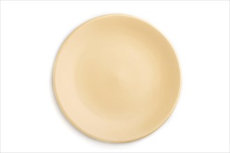 Empty beige ceramic plate isolated on white background. Top view, flat lay, close up