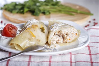 Cabbage rolls with beef, rice and vegetables on a linen tablecloth on a linen tablecloth. close up