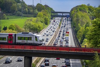 Local train S-Bahn, Regiobahn, S28, crossing the motorway A3, traffic on 8 lanes, incl. the