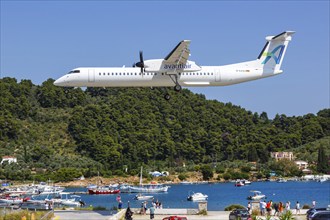 A De Havilland Dash 8 Q400 aircraft of Avanti Air with the registration D-AASH at Skiathos Airport,